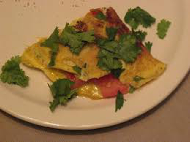 You are currently viewing Creamy tomato and Coriander omelette